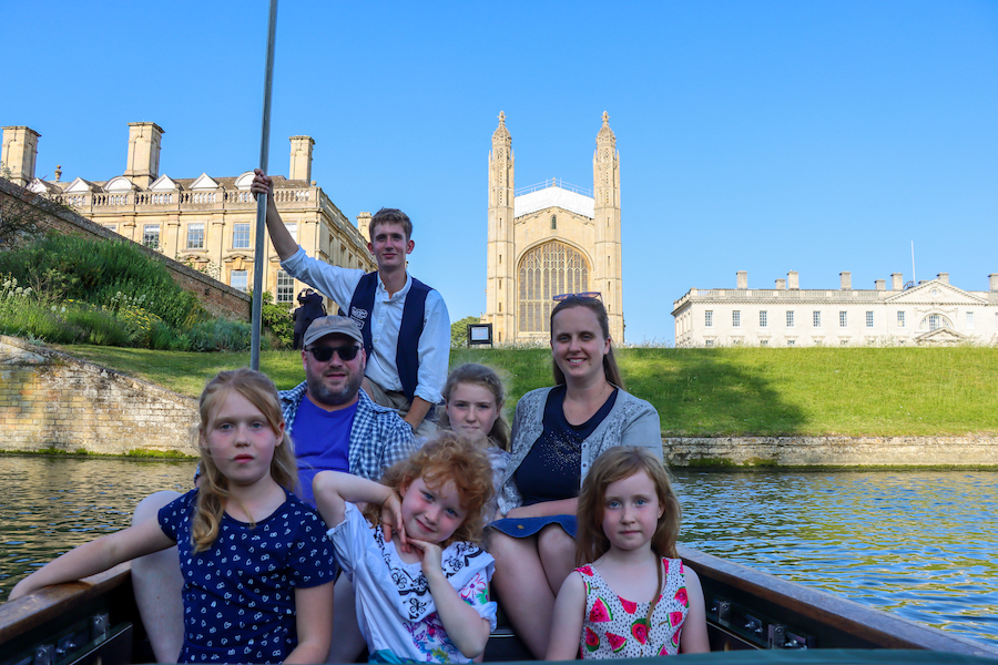 Family punting with private punt chauffeur in front of Kings College Cambridge